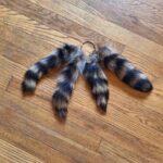 vZtxRk9G krazy bear hand select natural raccoon tails garment tanned 00007.jpg